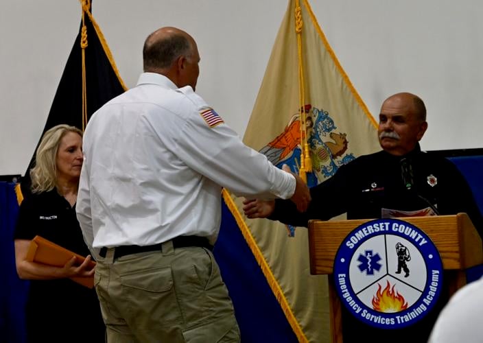 Volunteers Frank Liberato, Tom Vetter complete fire fighter one