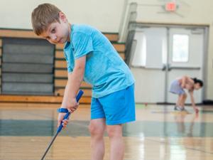 West Essex YMCA partnership brings youth golf instruction to camp news image