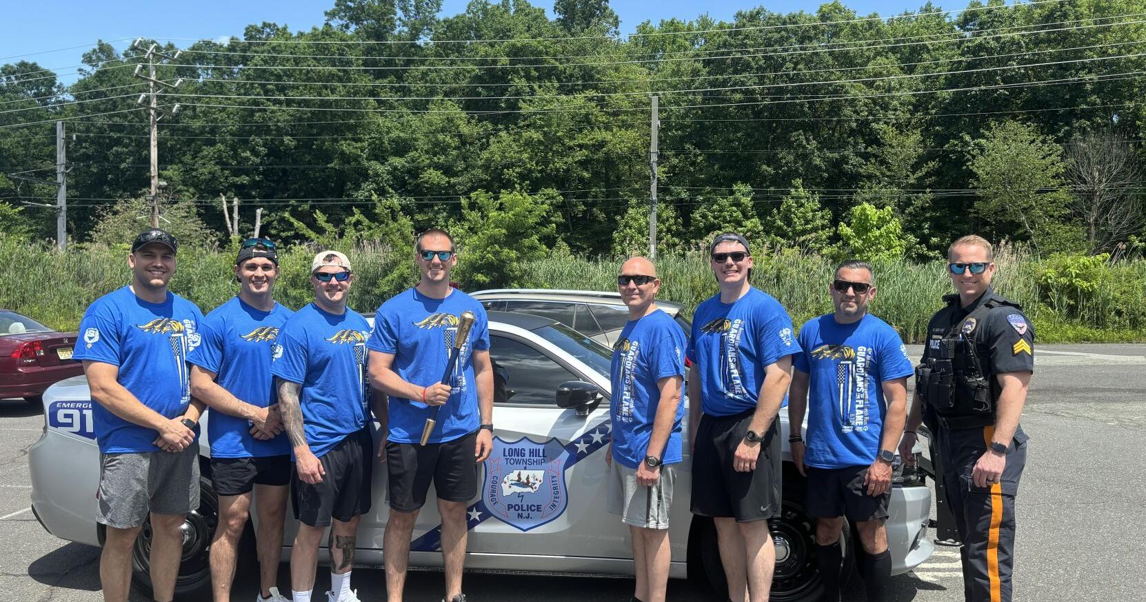 Long Hill police officers participate in the Torch Run to support Special Olympics - Vimarsana News
