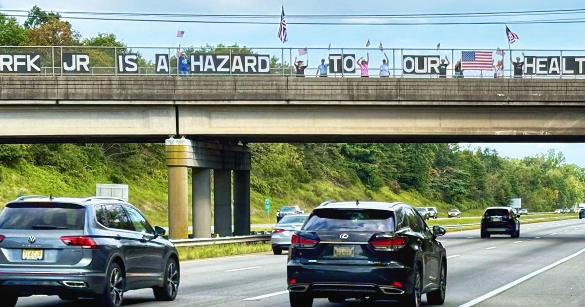 Rfk Unity Sign Visibility Brigade sign reads 'RFK Jr. is a hazard to our health ...