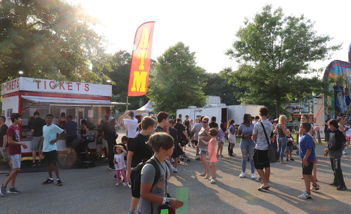 (VIDEOS) Showers or not, Mount Olive carnival packs them in Mount