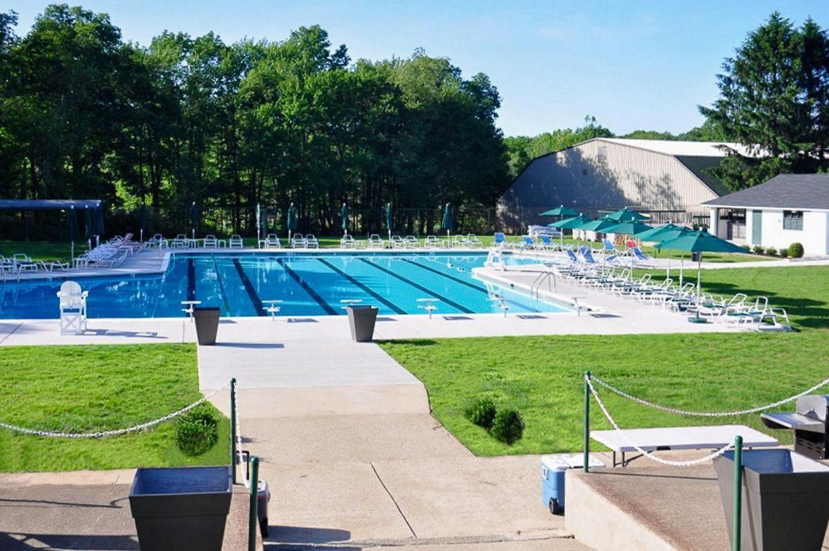 Closed sign doesn't stop sunbathers at Budd Lake Beach Mount Olive Chronicle News