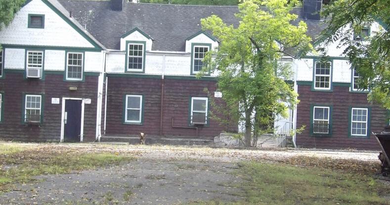 Housing quest at former school site draws crowd, questions