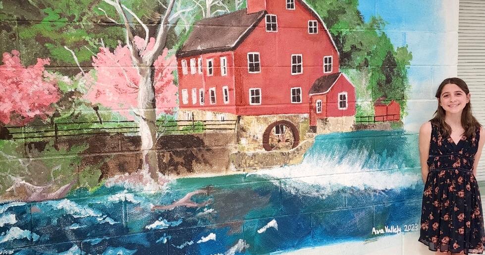 Outgoing 8th grader paints Red Mill mural on Clinton Township Middle