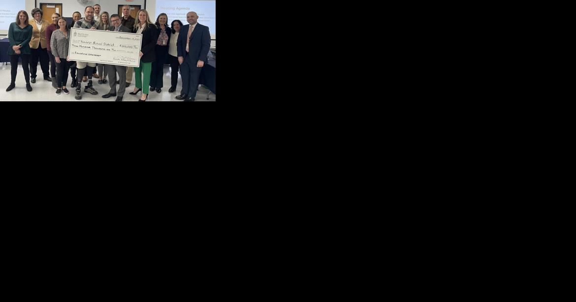 Bearing a large holiday gift, Bucco visits Randolph school board with check - Vimarsana News
