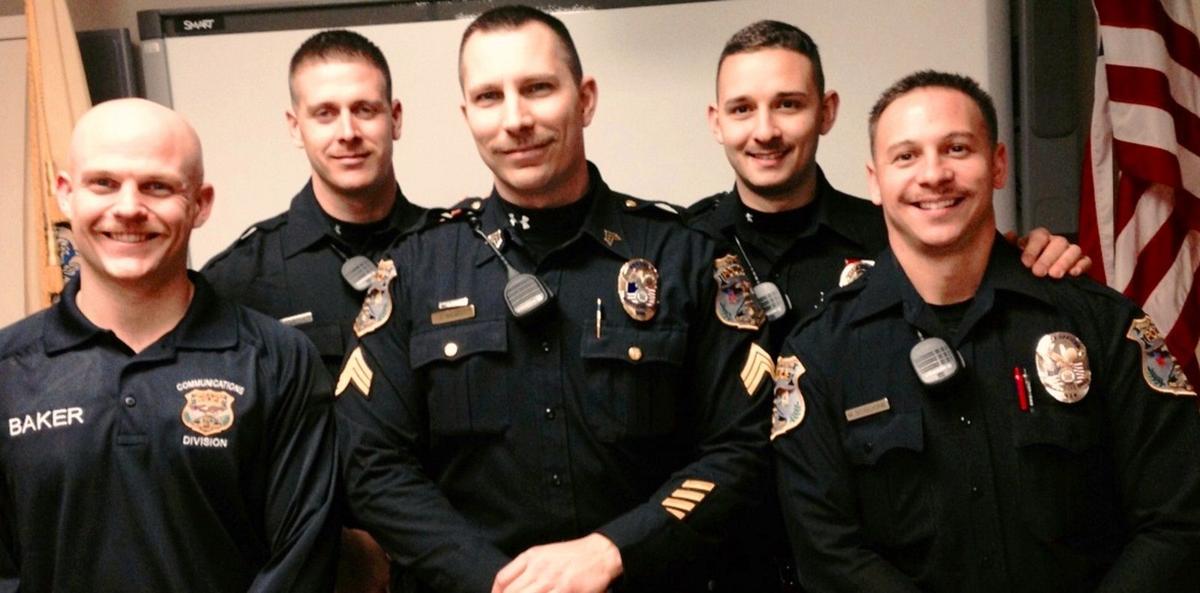 Mount Olive police let their hair down for men's health Mount Olive