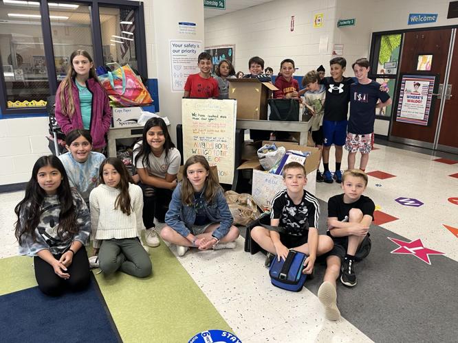 Tewksbury fifth graders collect books for Bridge of Books Foundation