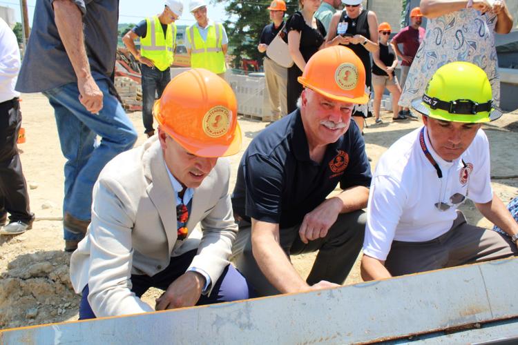New Polytech campus facility gets 'topping off' ceremony | News ...