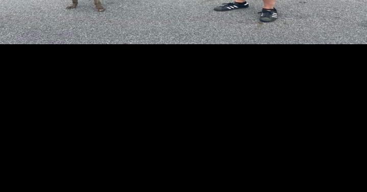 Military veteran and George Santos scam victim marches in Florham Park