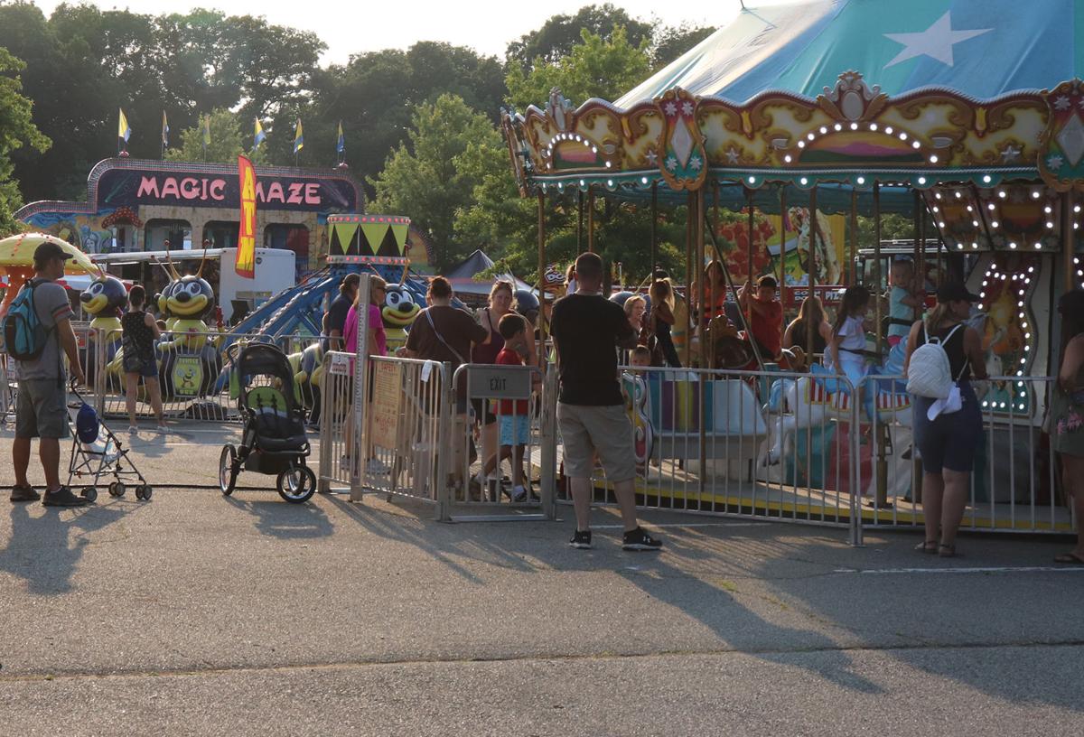 (VIDEOS) Showers or not, Mount Olive carnival packs them in Mount