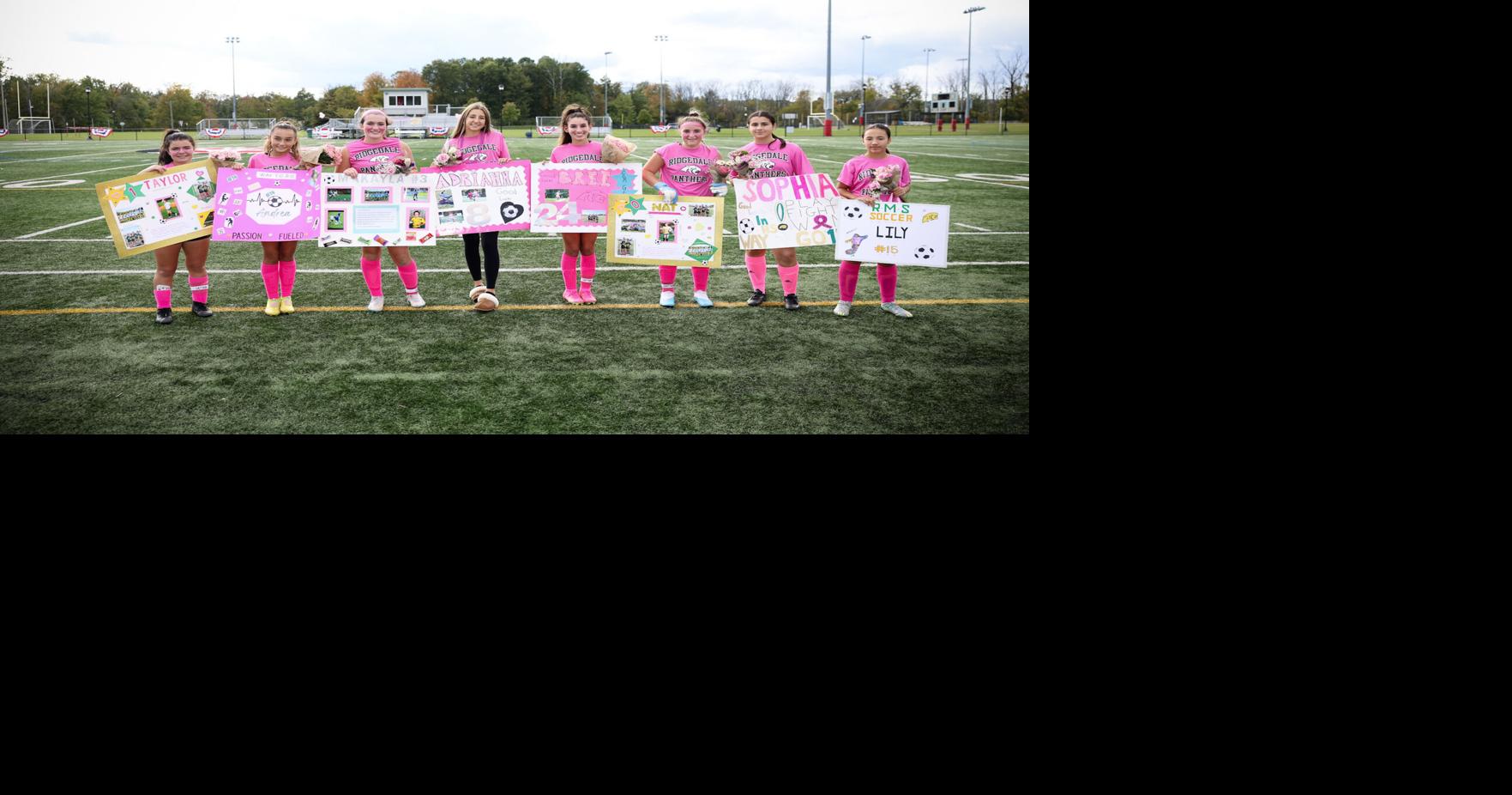 Michigan wearing Breast Cancer Awareness gear against Illinois 