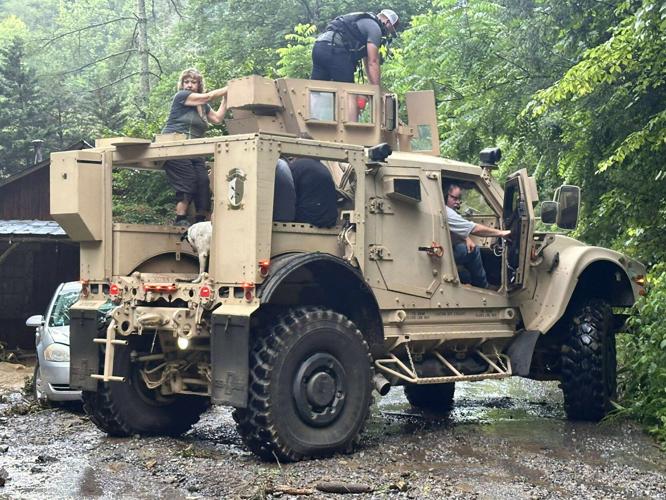 SWAT saves 6 people, 2 dogs during flooding | News | newportplaintalk.com