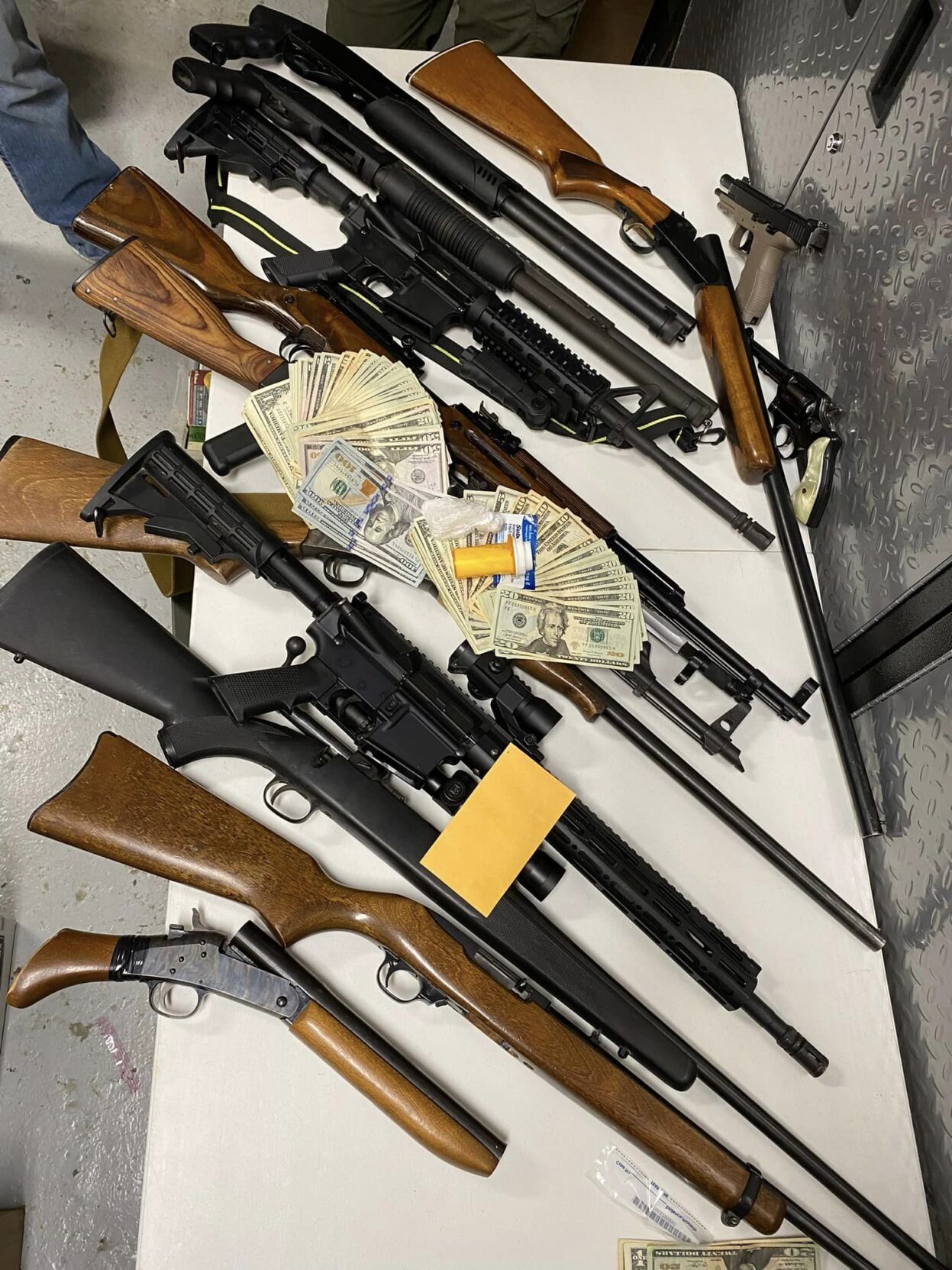 Weapons, drugs and cash seized in narcotics raid | News ...