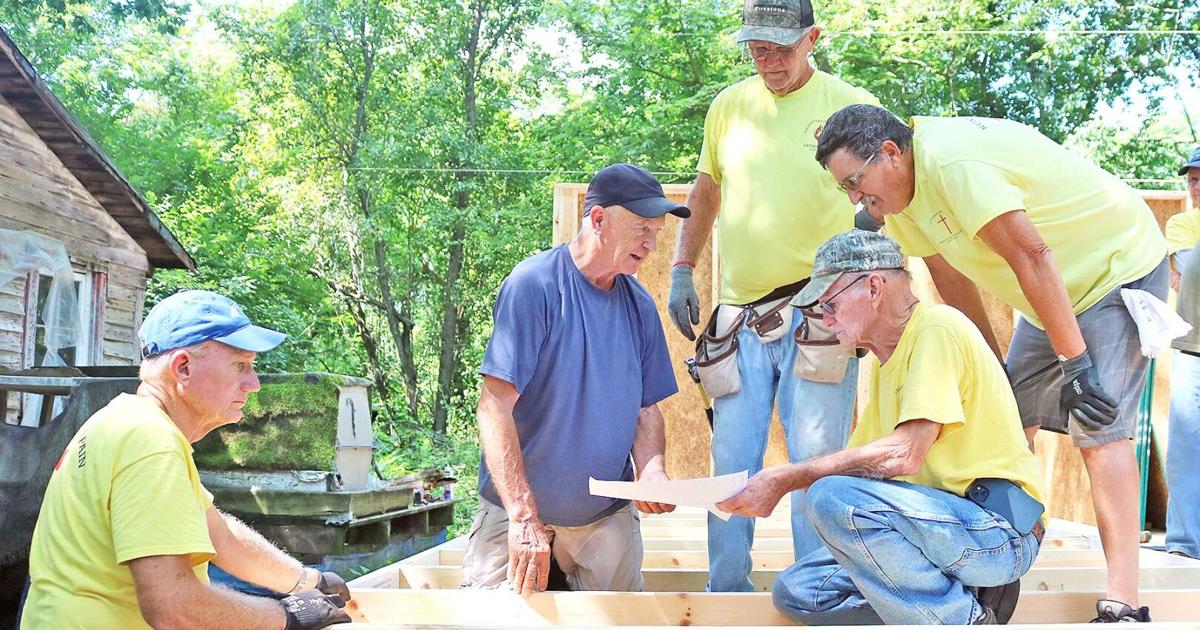 Volunteers building new home for elderly woman