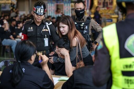 Red or black: Thai men tempt fate at military draft draw | National ...