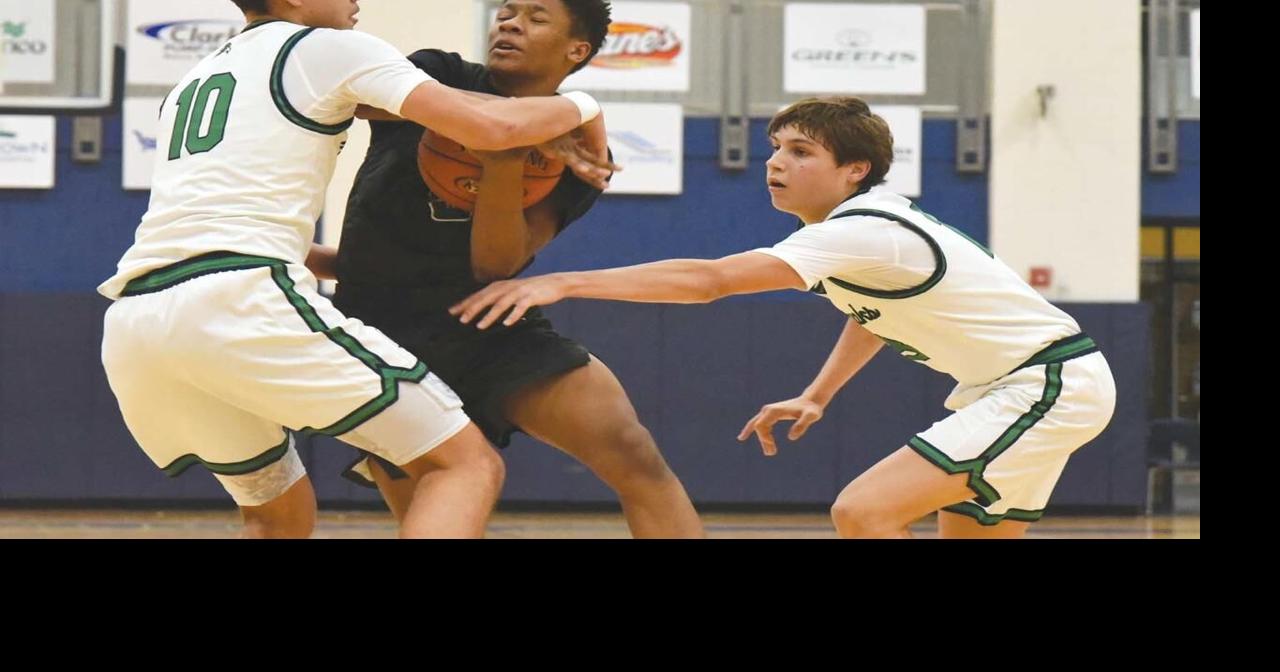 Boys' basketball: Warhawks wallop Wolverines, continue lengthy district ...