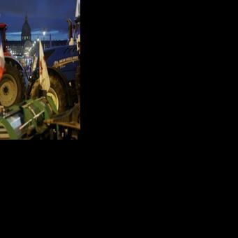 Protesting French farmers parked their tractors near the National Assembly in central Paris