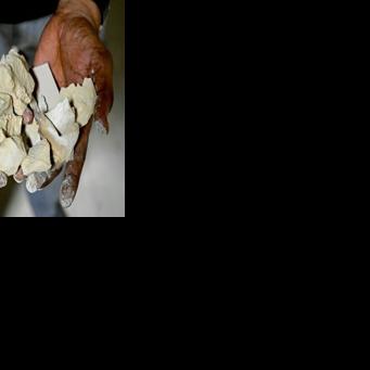 The tile industry developed in Gujarat due to the availability of clay and good transport connections, but it relies on overseas energy to fire