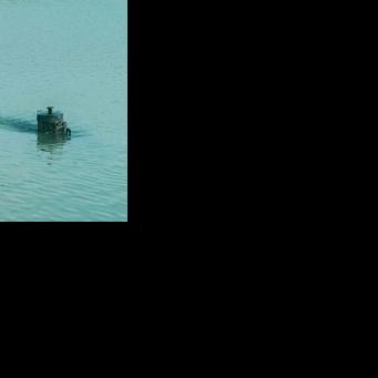 Unlike the Chinese navy's advanced nuclear-powered submarines that can spend months submerged, Zhang's sub uses a small battery and electric motor, can travel just four knots per hour and needs to surface after half an hour