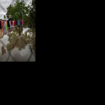 Category 3 Hurricane Erin leaves standing water across the region in Naguabo, Puerto Rico