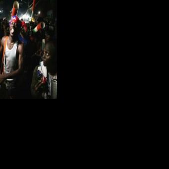 Fans celebrate in the streets of Port-au-Prince after Haiti's football team beat Nicaragua to qualify for the 2026 FIFA World Cup