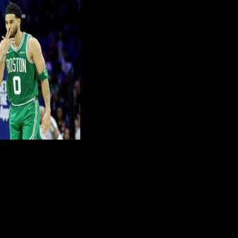 Boston's Jayson Tatum celebrates a three-pointer in the Celtics' victory over the Philadelphia 76ers in game four of their NBA playoff series