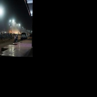 Vehicles queue for petrol at a service station in Bamako on October 27, 2025