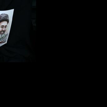 Iranians pay tribute to slain supreme leader weeks after killing