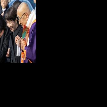 Japan's Prime Minister Sanae Takaichi (centre, R) and superintendent priest Shokaku Furuya (R) see off South Korea's President Lee Jae Myung at the Horyu-ji Temple in Ikaruga, Nara prefecture on January 14, 2026