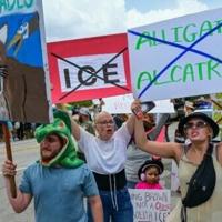 Demonstrators protest the construction of an immigrant detention center, dubbed "Alligator Alcatraz," in the Everglades near Ochopee, Florida