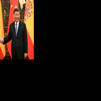 Spain's Prime Minister Pedro Sanchez (L) shakes hands with Chinese President Xi Jinping (R) in Beijing during a visit in 2023