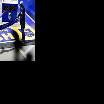 John Korir of Kenya takes the tape to complete back-to-back Boston Marathon victories