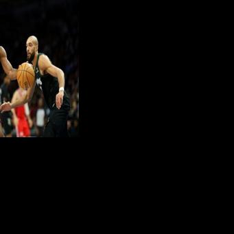 Kawhi Leonard of the Los Angeles Clippers dribbles past Minnesota's Rudy Gobert on his way to scoring 41 points in an NBA victory over the Timberwolves