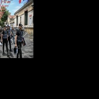 Turkish riot police fanned out around Taksim Square and Istiklal Avenue, putting up metal barricades to prevent any protests