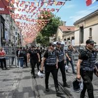 Turkish riot police fanned out around Taksim Square and Istiklal Avenue, putting up metal barricades to prevent any protests