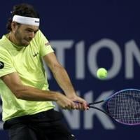 American Taylor Fritz hits a backhand n the way t a victory over Spain's Roberto Carballes Baena at the ATP Toronto Masters
