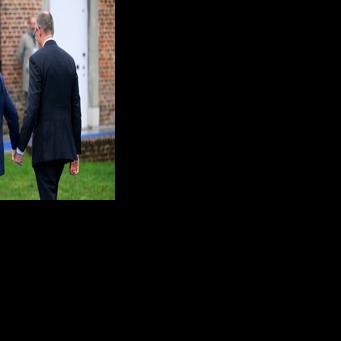 French President Emmanuel Macron and German Chancellor Friedrich Merz sought to downplay their differences before EU leaders' talks on Thursday