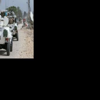 French peacekeepers with the United Nations Interim Force in Lebanon cross the Qasmiyeh Bridge towards Sidon and Beirut