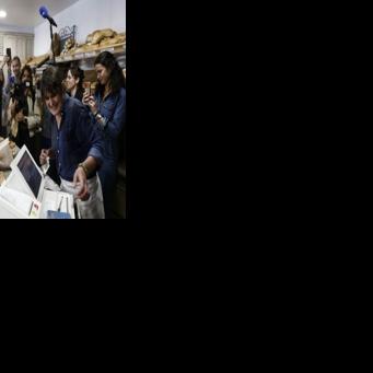 France's Prime Minister Sebastien Lecornu buys his bread