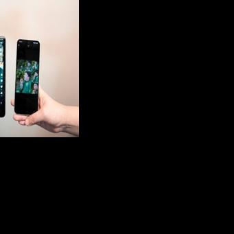 This photo illustration shows phones displaying the screenshots of Chinese Hanfu stylist Baicai's social media post (left) and the AI microdrama (right) accused of stealing his likeness