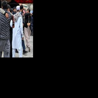 Medics and bystanders helped unload victims with blood-soaked clothes from the back of ambulances and vehicles