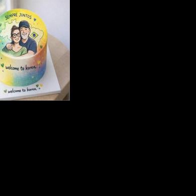 This undated handout photo released by the South Korean Presidential Office in Seoul shows a cake decorated with an illustration of Brazil's President Luiz Inacio Lula da Silva and his wife Rosangela da Silva to welcome their visit to South Korea