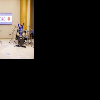 South Korea's President Lee Jae Myung (L) and Japan's Prime Minister Sanae Takaichi playing drums, in Nara, Nara Prefecture