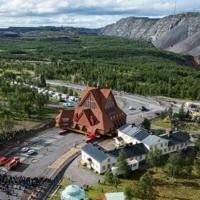 Kiruna Kyrka, an imposing 672-tonne Swedish Lutheran church from 1912, is being moved five kilometres (three miles) on remote-controlled flatbed trailers