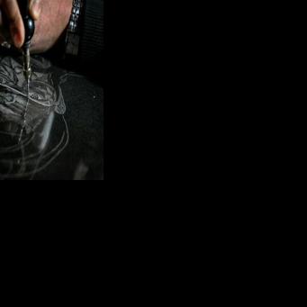 Engraved tombs help keep memories alive in Pakistan