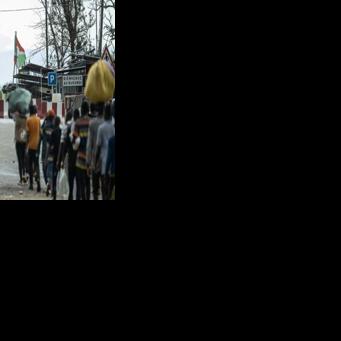 Displaced Burundian nationals attempt to return home following the closure of the border between the Democratic Republic of Congo and Burundi at the Kavimvira checkpoint