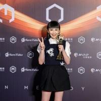 Taiwanese singer Waa Wei poses for photographs after winning the Best Female Singer (Mandarin) at the 36th Golden Melody Awards Ceremony at Taipei Arena, in Taipei on June 28, 2025