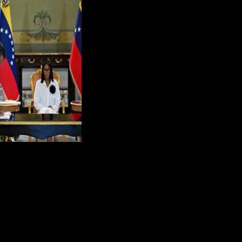 Chevron Venezuela Mariano Vela signed the deals next to Venezuela's interim President Delcy Rodriguez during a ceremony at the Miraflores Palace in Caracas
