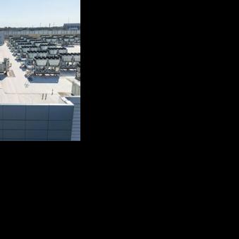 Cooling vent fans are seen on the roof of a Digital Realty data center in Ashburn, Virginia