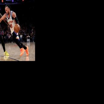 New York's Jalen Brunson drives against Dorian Finney-Smith in the Knicks' NBA win over the Houston Rockets